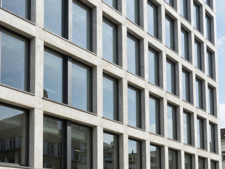 Modern Swiss architectural details, clean glass facade of a commercial building in Zurich, bright natural daylight, sharp focus.