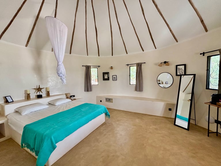 Chambre supérieure de l'hôtel de luxe Maison Fimela situé dans le Sine Saloum