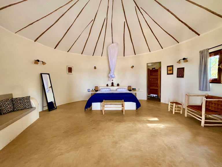 Chambre supérieure de l'hôtel de luxe Maison Fimela situé dans le Sine Saloum