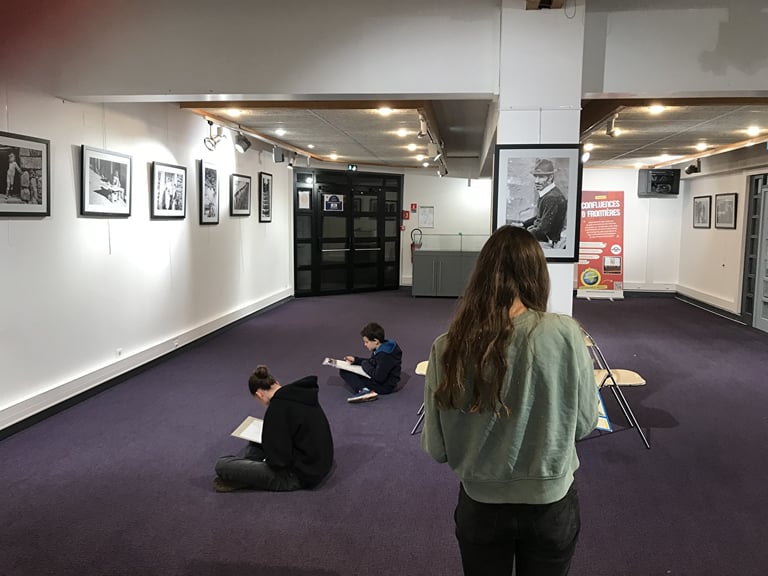 second photo of the art workshop students visiting the exhibition