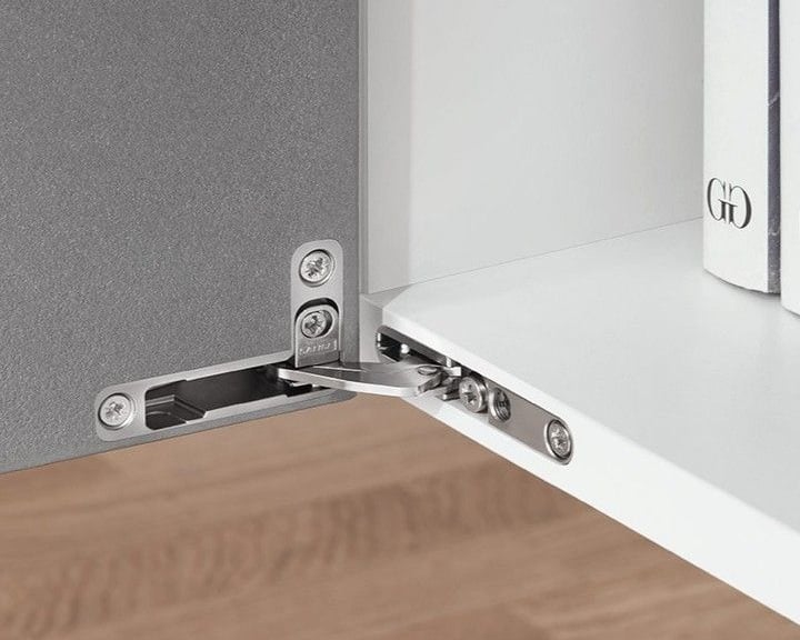 Invisible Air hinge installed in a modern modular cabinet by SR Enterprises