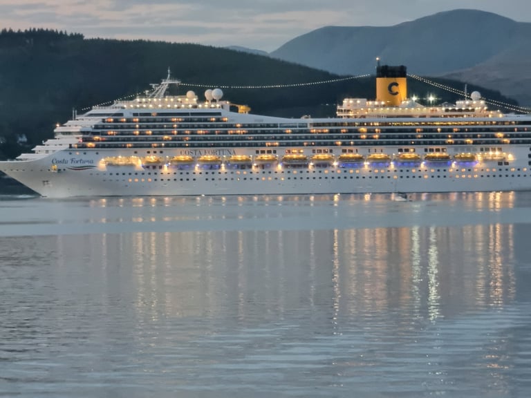 View from the window at at Gourock Seaview Holiday Let cruise ship in the water with mountains
