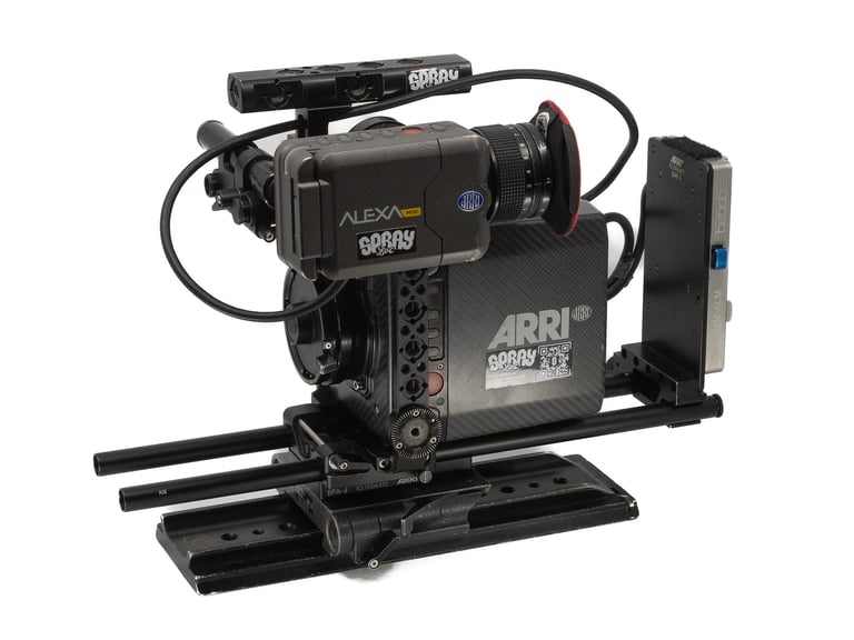 Professional ARRI Alexa Mini cinema camera rig with lens, mounting rails, and view finder on a white background.