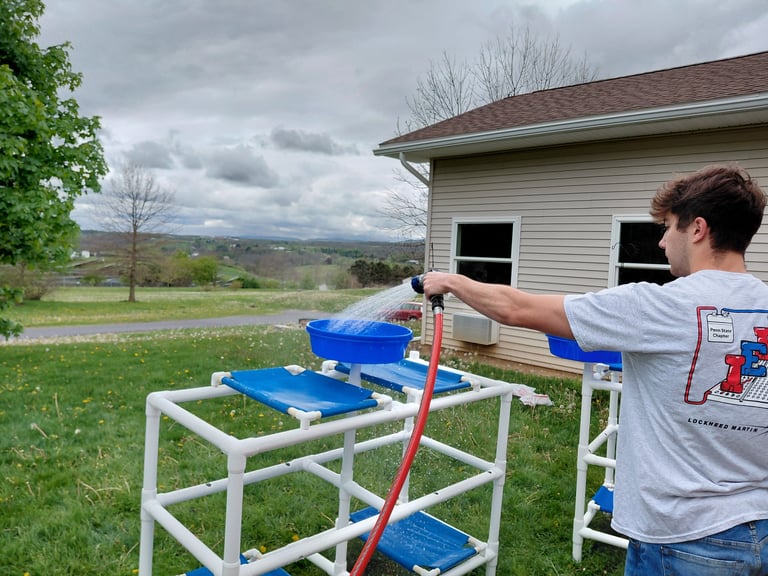Outreach event at local animal shelter Centre County Paws, student volunteers