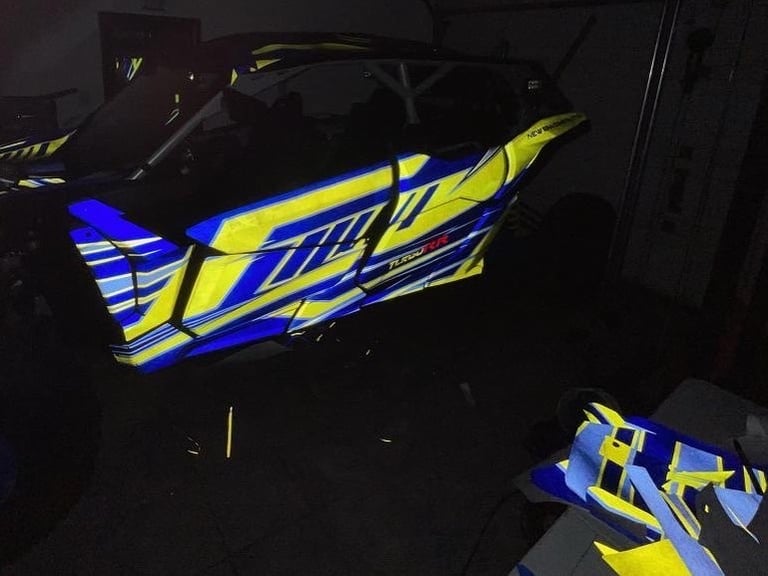 off road can am maverick reflective wrap. blue and fluorescent yellow wrap