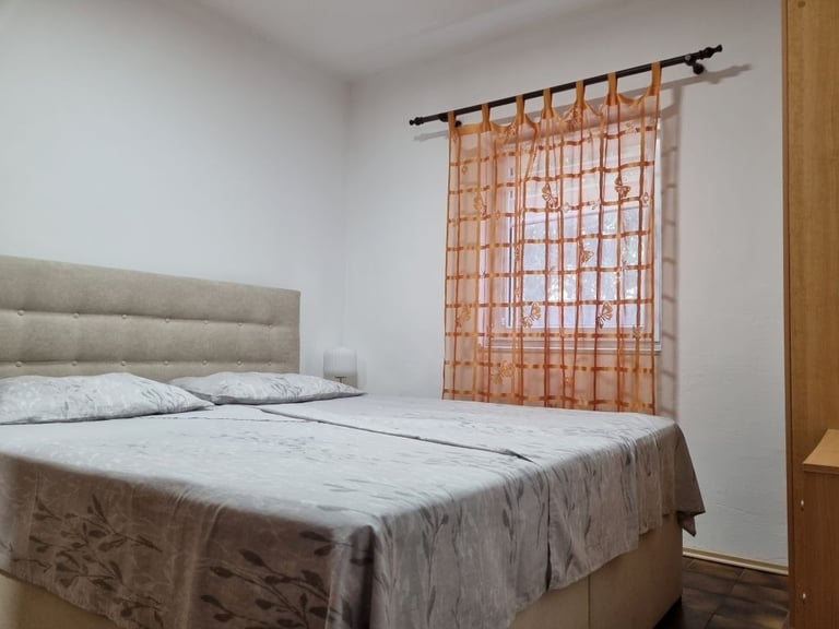 Quiet bedroom with double bed and orange curtains, Easy Living, Lokva Rogoznica
