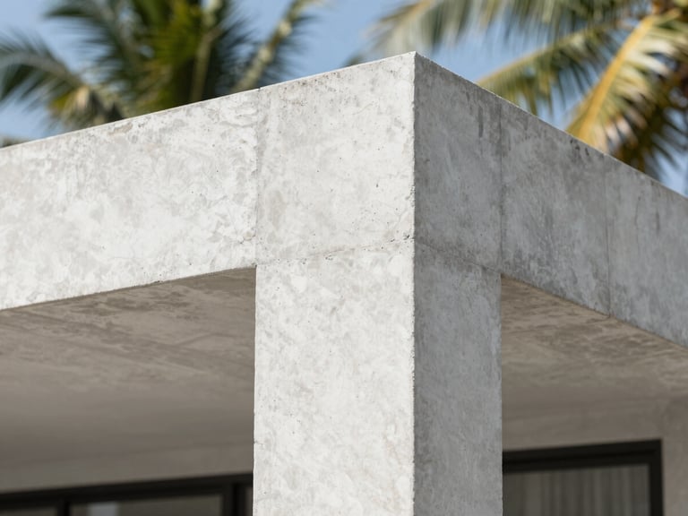 Extreme close-up of a pristine poured concrete architectural joint on a modern villa, sharp focus, bright tropical sunlight casting clean shadows.