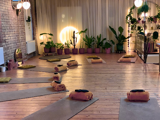 Atmospheric  room with mats and towels on the floor