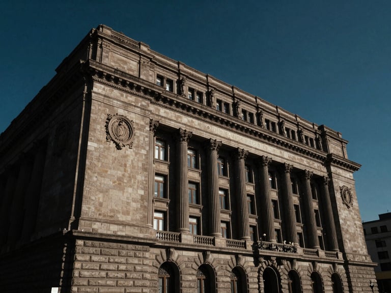 Low-angle dramatic architectural shot of a federal court house in Mexico City, high-contrast side lighting, deep navy tones, 35mm