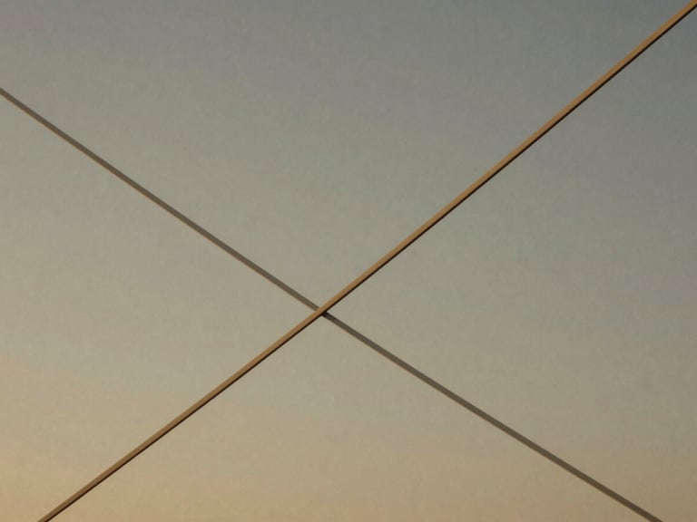 Abstract representation of financial growth, elegant lines intersecting, soft golden light, minimalist, muted tones, medium-format film