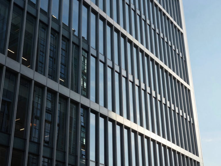Wide architectural perspective of a modern high-end corporate glass facade, sharp focus, cool office daylight, deep navy shadows, 35mm