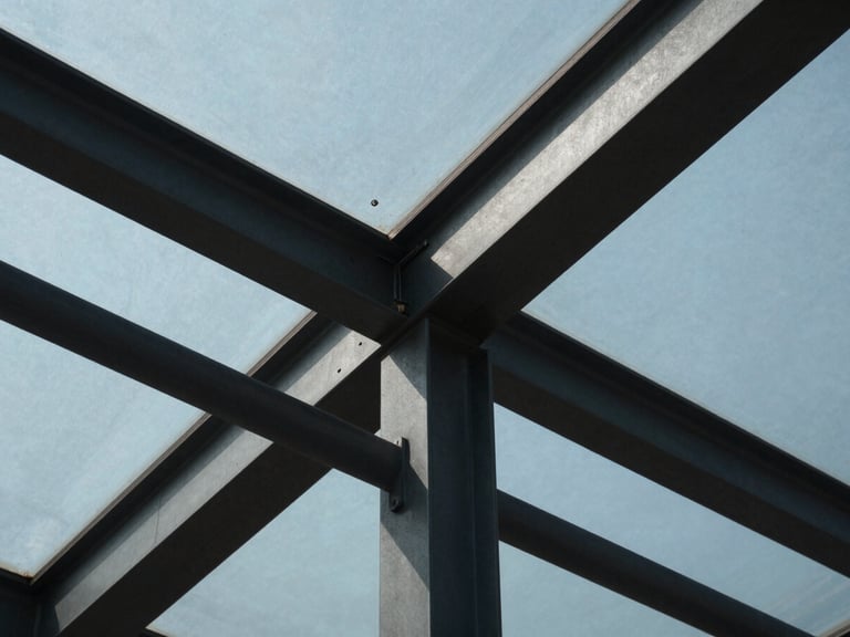 Macro shot of architectural structural steel and glass panels, sharp angles, dark high-contrast shadows, clean minimal lines.