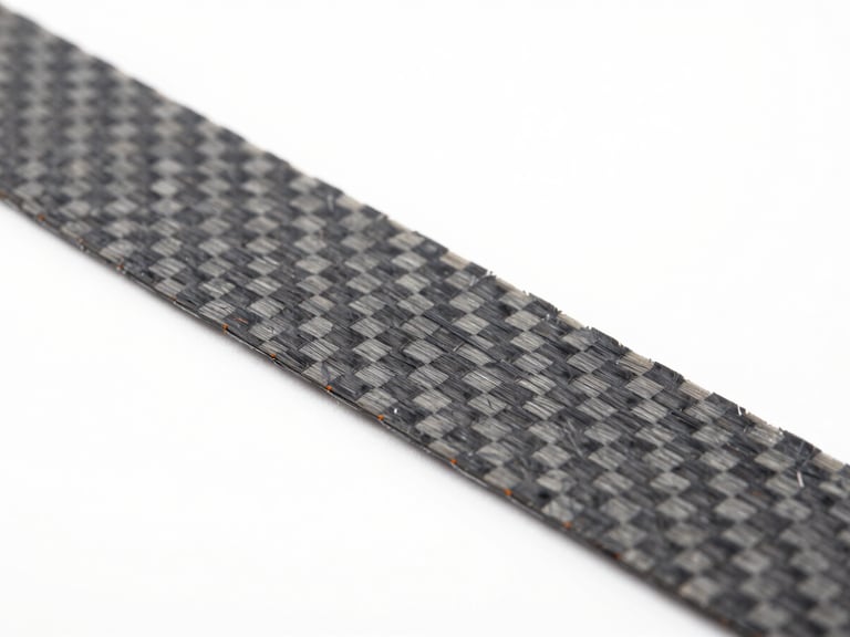 Macro shot of carbon fiber composite filament texture, showing individual micro-fibers, bright high-key lighting, clean white background
