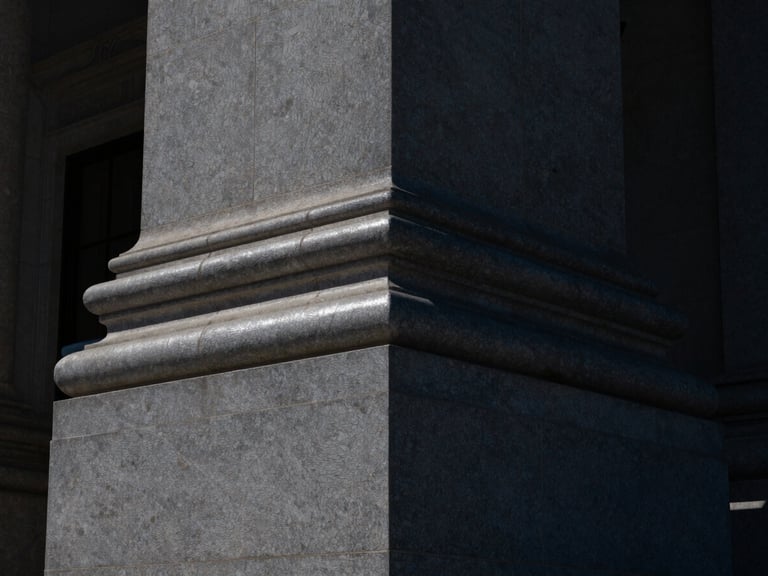 Architectural detail of a modern supreme court building stone pillar, sharp focus, dramatic dark shadows, silver highlights