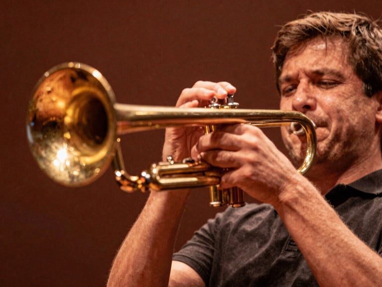 Dynamic close-up of a trumpet player on stage, brass instrument catching warm stage lights, intentional motion blur, rich terracotta tones.