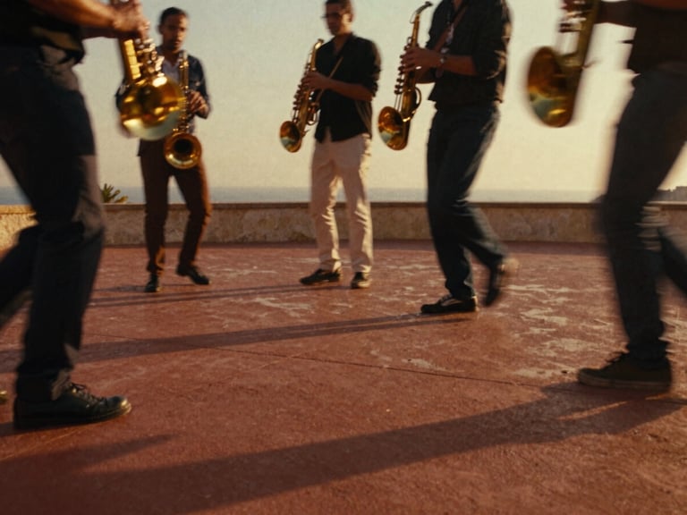 Cinematic low-angle shot of a brass section catching golden hour light, musicians in motion, deep terracotta shadows, 35mm film grain, motion blur.
