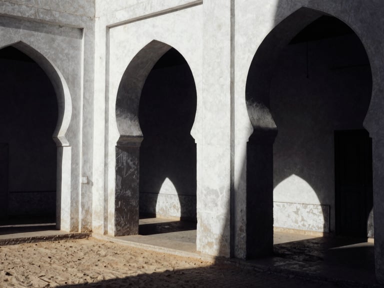 Stark high-contrast black and white architectural detail of Mogadishu historic arches, dramatic natural sunlight, deep shadows