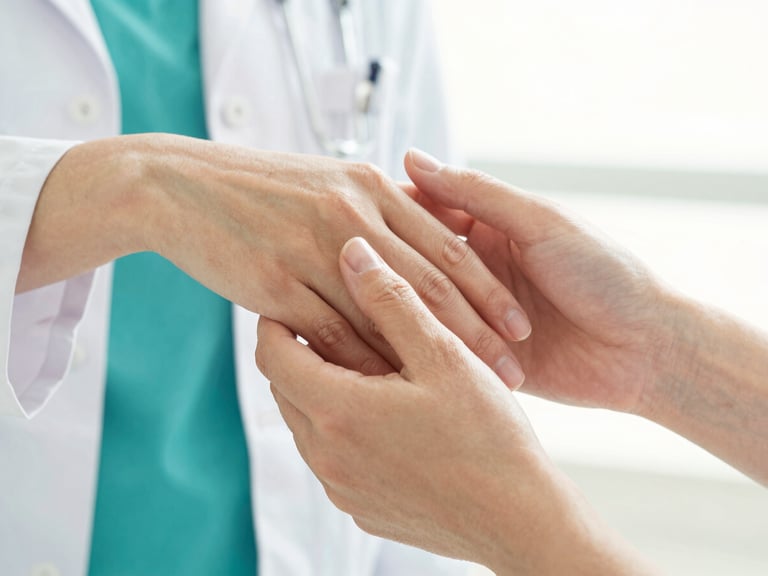 Close-up of gentle hands-on care interaction, soft natural daylight, premium clean medical aesthetic.