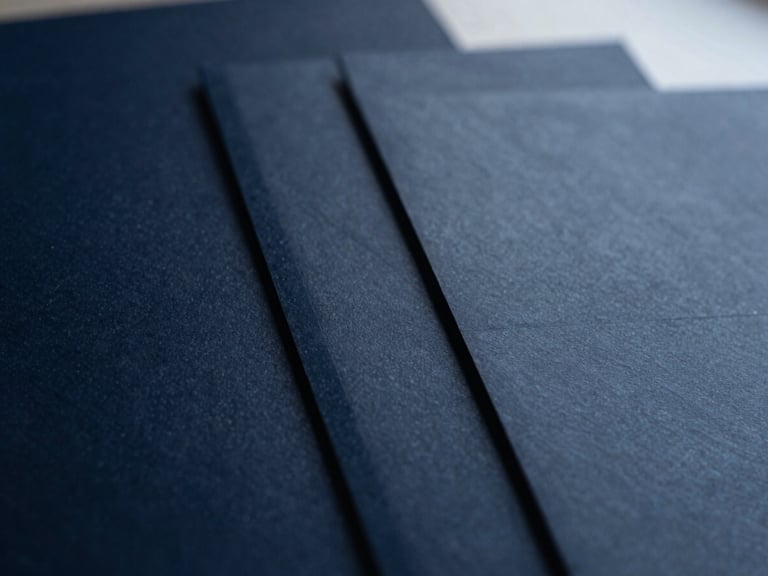 Macro photography of structured corporate documents, sharp focus, deep navy shadows, overcast light, 35mm
