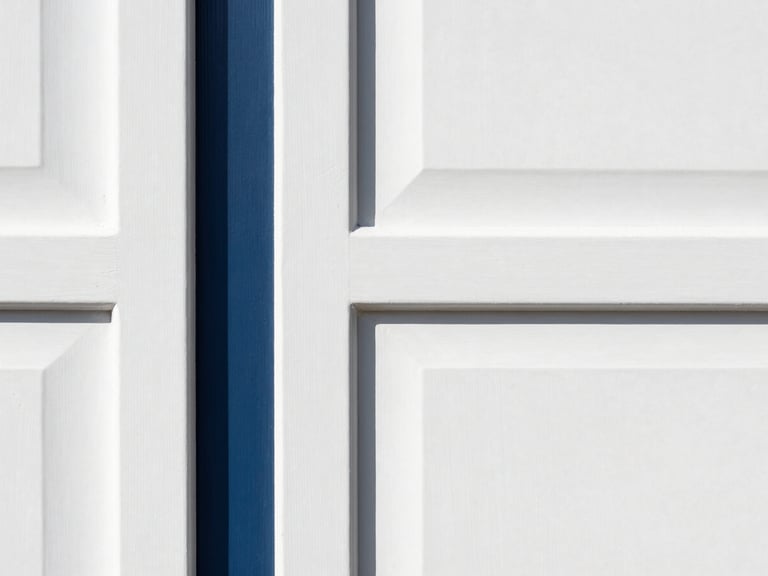 Crisp architectural detail of a freshly painted cabinet door, bright natural daylight, flawless semi-gloss finish, sharp focus, 35mm.
