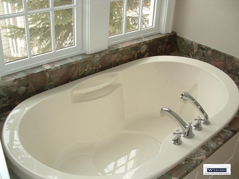 Modern bathroom remodeling project with custom walk in shower & soaking bathtub in Deerfield IL. IL.
