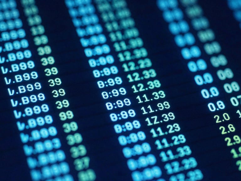 Macro shot of a glowing digital screen displaying financial data in a monospaced font, neon-cyan and indigo accents, high-contrast tech aesthetic.