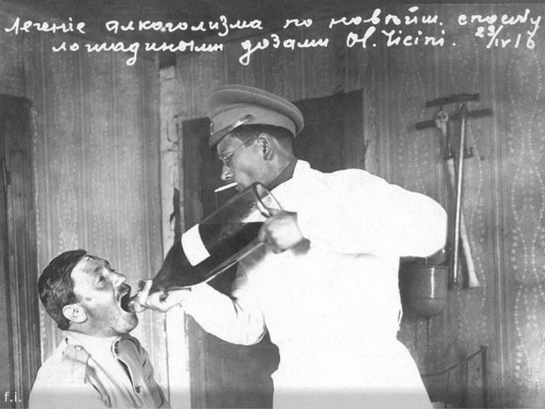 Vintage black and white photo showing a historical medical procedure with a large bottle and text.