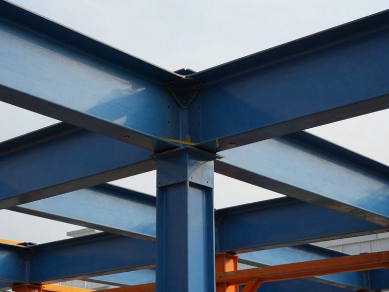 Active industrial job site showing steel beam structural modifications and high-contrast lighting