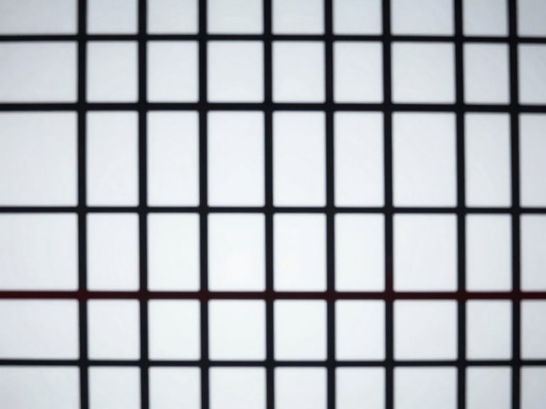 Abstract graphic representing a static, fixed payment structure, sharp lines, monochrome with a hint of red, cool office lighting, high contrast