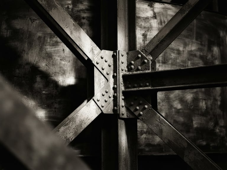 Monochrome close-up of structural steel intersections, dramatic side lighting with deep shadows, textured brush background, desaturated warm tones, medium format film