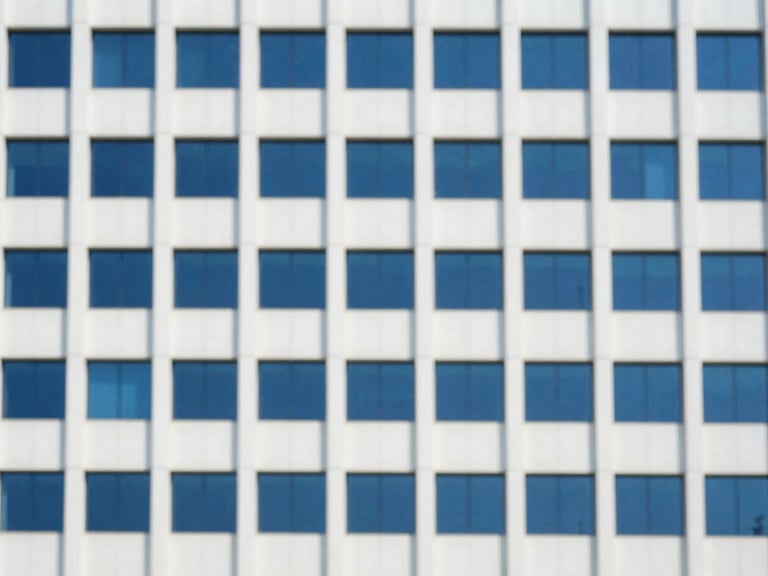 Minimalist architectural detail of a modern corporate headquarters in Mumbai, bright natural daylight, soft shadows