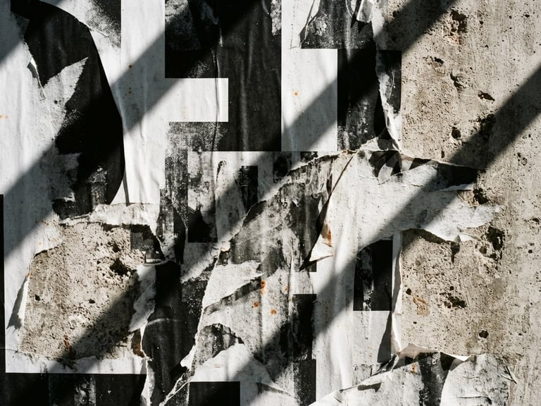 Extreme close-up of a high-contrast black and white billboard pasted on a concrete wall, harsh sunlight casting deep diagonal shadows, 35mm film grain.