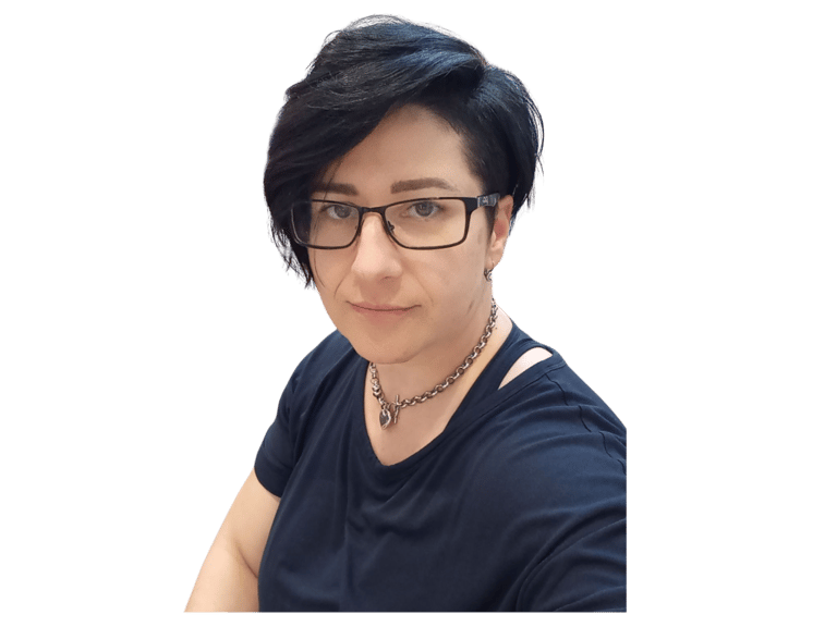 a woman with glasses and a necklace on her neck