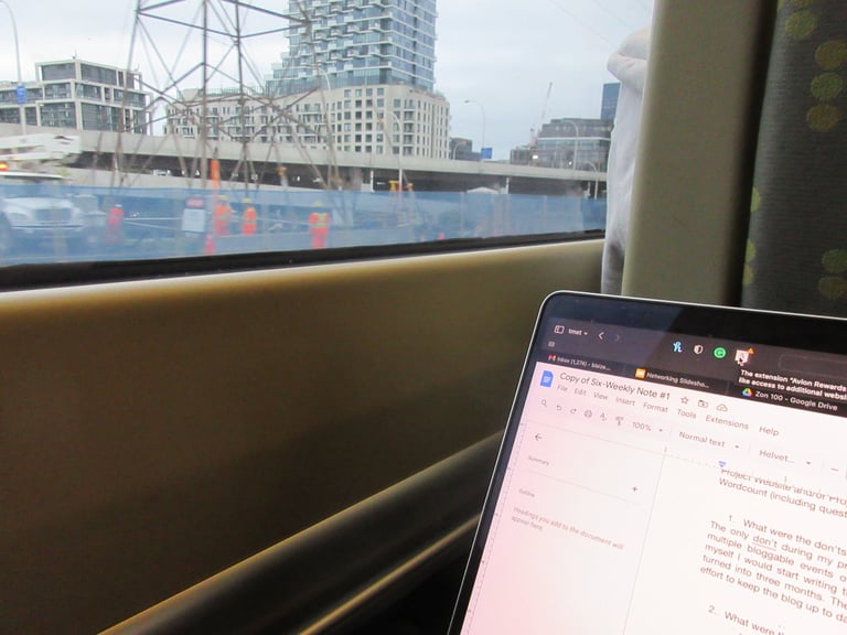 a laptop computer sitting on a table with a laptop on it