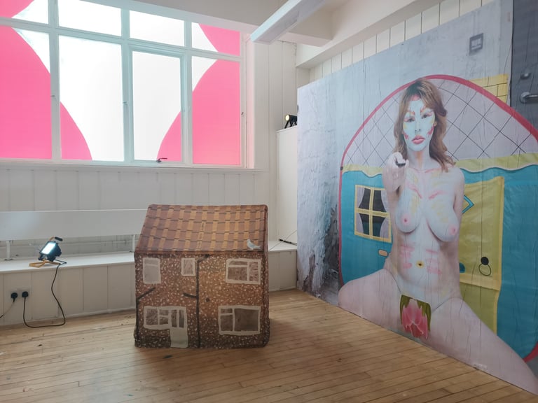 Exhibition view of three art pieces.