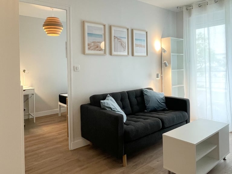 a living room with a couch and a table