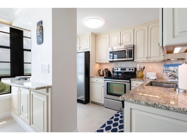 a kitchen with views of the Marco beach