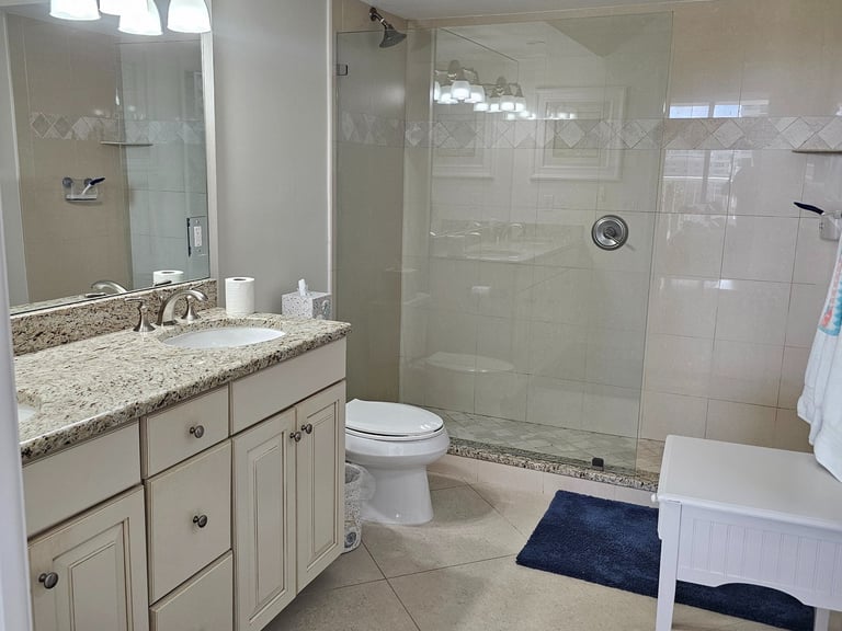 a large bathroom with a walk in shower