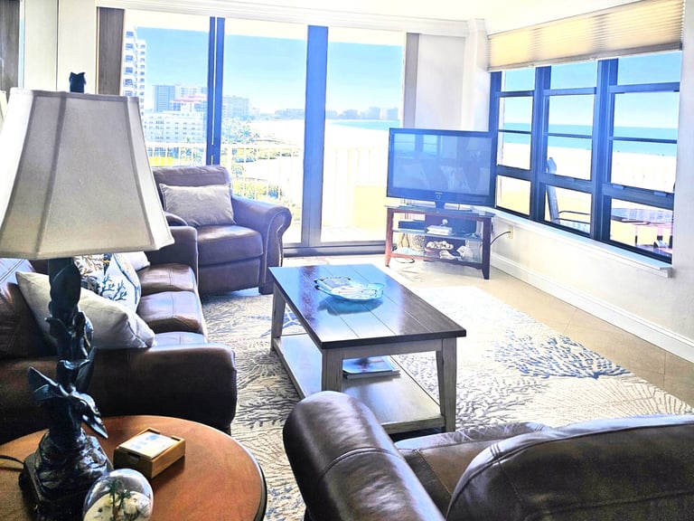 a living room with a large window and a large window