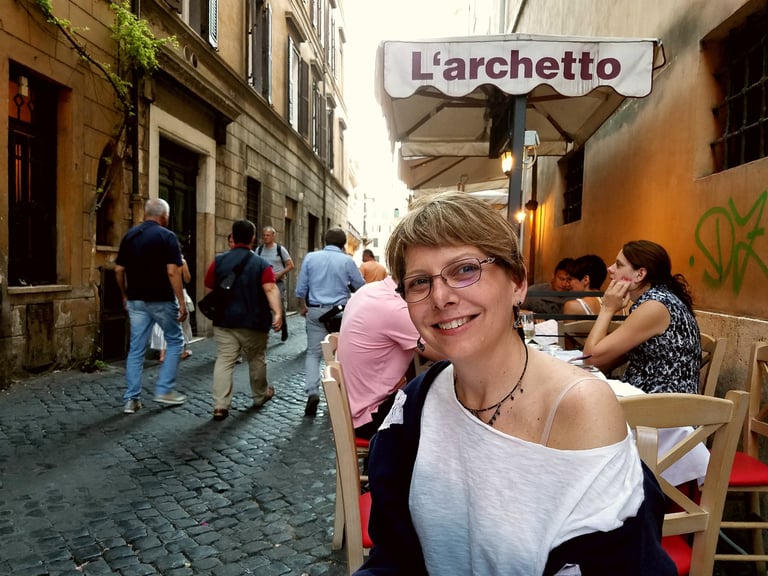 Lady Michelle prepares for street side dinner in Rome, Italy