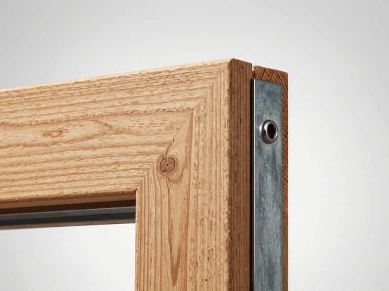 Close-up of a pine shed corner joint showing mortise and tenon joinery, galvanised steel bracket visible, overcast studio strobe light revealing wood grain texture and annual rings, no people