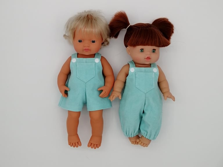 Miniland doll and Minikane doll dressed in handmade dungarees