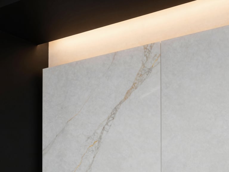 Close-up of luxury white marble alternative paneling with golden veins, warm architectural lighting, sharp focus.