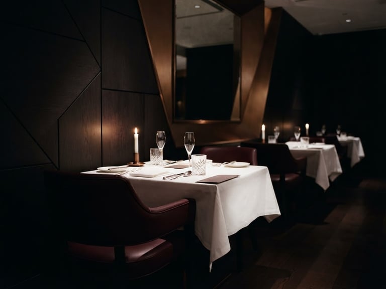 luxury editorial photography of a pristine empty fine dining room with sharp architectural angles, dramatic low-key side lighting, deep shadows, 35mm