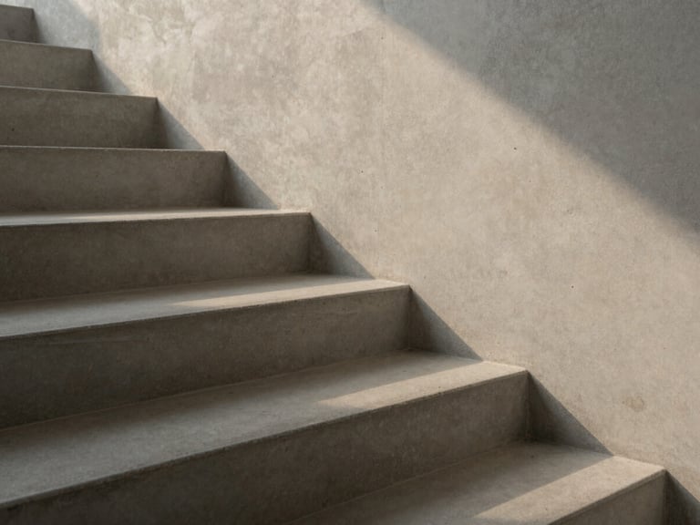 Close-up of concrete stairs with hard diagonal shadows from soft evening sun, minimalist composition, neutral muted tones, high contrast.