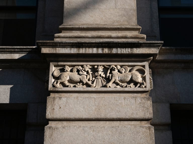 Architectural detail of a classic stone financial institution, focusing on a carved stone relief, high contrast, deep shadows.