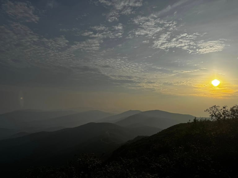 A sunrise view of Shenandoah's cool mountains is pictured.