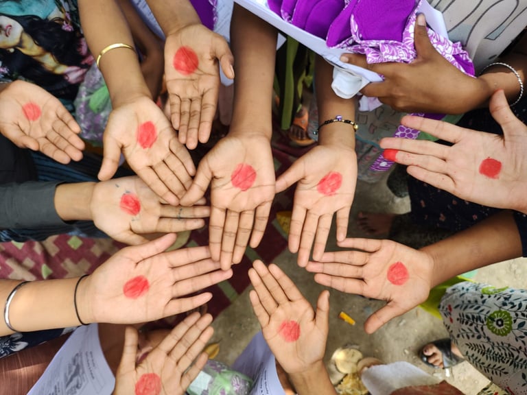 Red dots on eleven children's' palms.