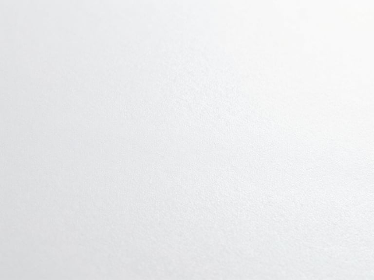 Macro shot of a perfectly smooth, durable powder-coated surface, showing fine texture and uniform finish under bright, high-key studio lighting. Minimalist composition, 35mm.