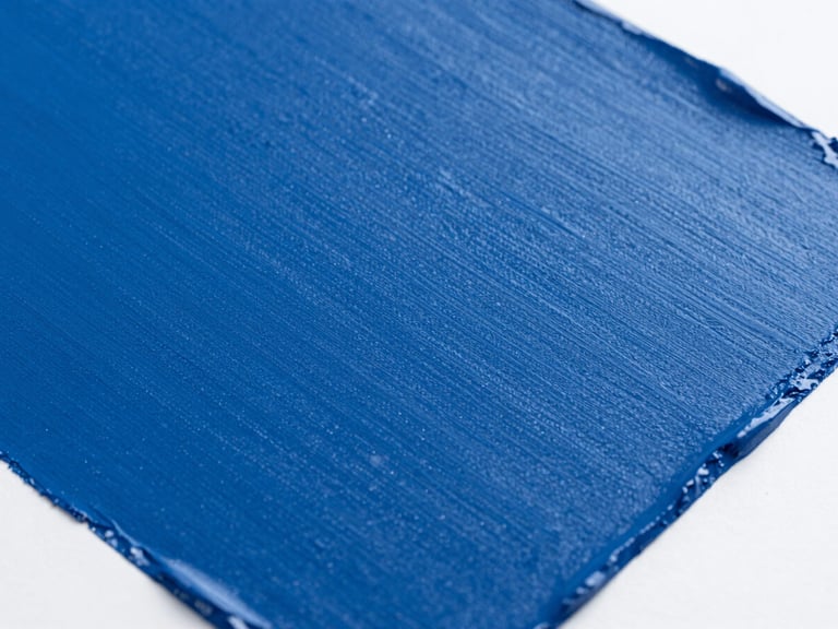 Close-up of a vibrant industrial paint swatch, showcasing deep color and excellent coverage, with a subtle texture. Bright studio lighting, sharp focus on the paint film, minimalist composition, 35mm.